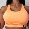 Racerback sports bra with seam detailing | Orange