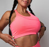 Racerback sports bra with seam detailing | Neon Pink