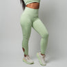 Twisted cut-out legging | Pastel green.